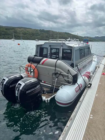 2009 Cantieri Mariner 8.3 Cabin RIB — Stern-to at the pontoon
