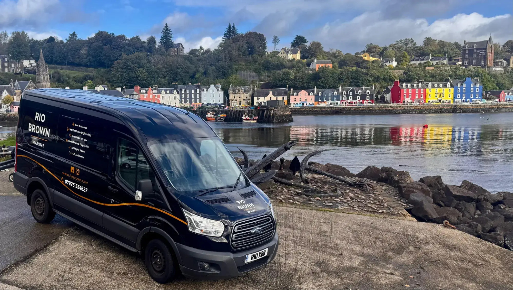 The Rio Brown Marine van on the slipway at Tobermory, the coloured seafront behind